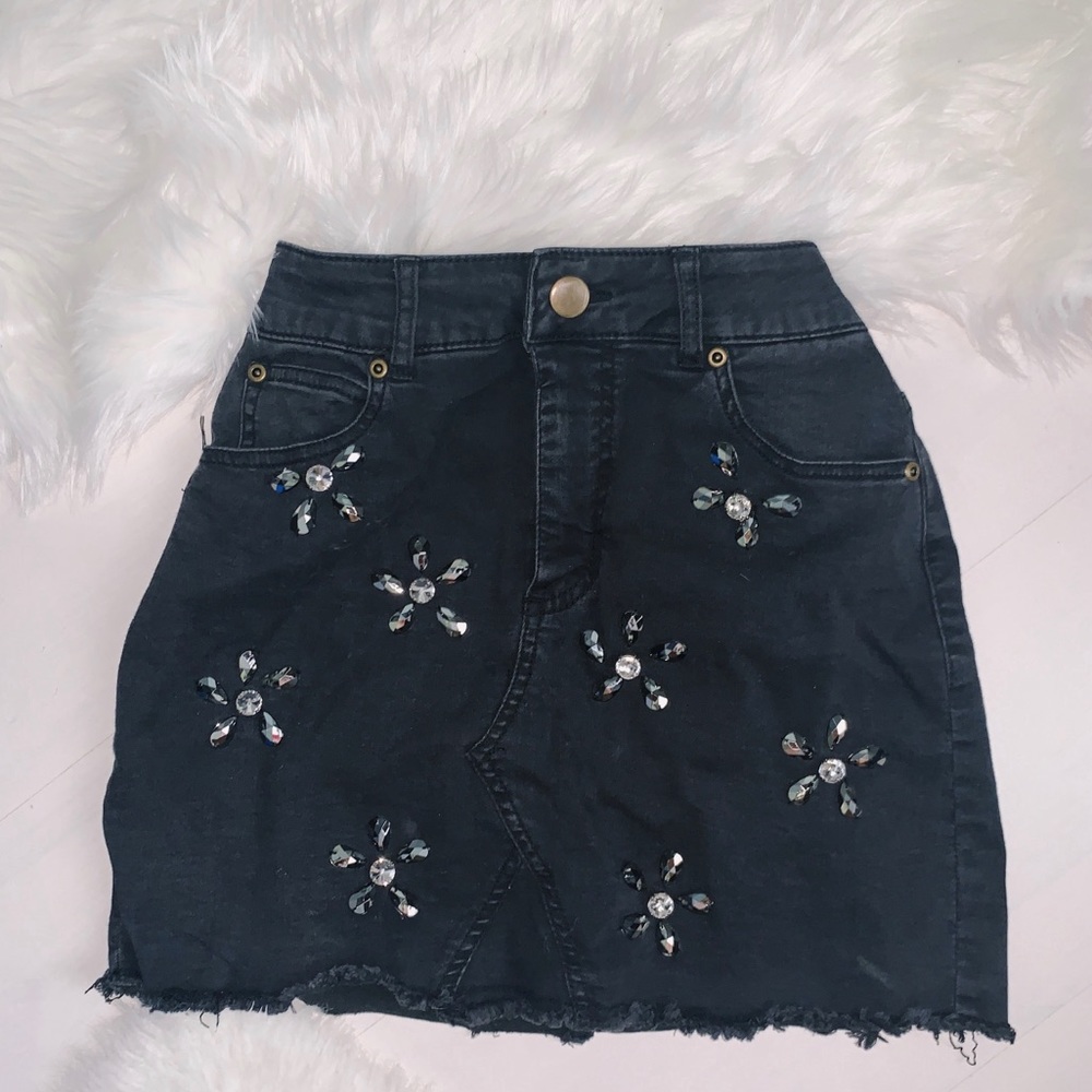 Black jeweled mini skirt